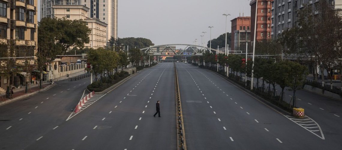 WUHAN, CHINA - FEBRUARY 03:  (CHINA OUT) A man cross an empty highway road on February 3, 2020 in Wuhan, Hubei province, China. The number of those who have died from the Wuhan coronavirus, known as 2019-nCoV, in China climbed to 361 and cases have been reported in other countries including the United States, Canada, Australia, Japan, South Korea, India, the United Kingdom, Germany, France, and several others.  (Photo by Getty Images)